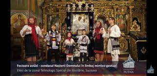 Elevii de la liceul tehnologic special pentru elevi cu deficiențe de auz, din localitatea bivolărie, suceava, colindă la mănăstirea putna. Liceul Tehnologic Special BivolÄrie Alexandra Nadane