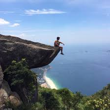 Pedra da gávea is a mountain in tijuca forest, rio de janeiro, brazil. Daredevils Dangle From Top Of Pedra Da Gavea 2 769 Ft Above Ground Daily Mail Online