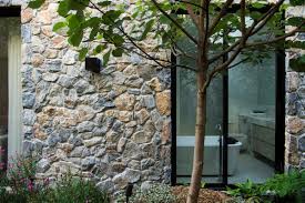 Before using any wall tiles made of natural stone in the kitchen, for instance to cover the wall between hanging cabinets and countertop, you need to make sure to use a natural stone that is easy to clean. Top Five Questions About Stone Wall Cladding Eco Outdoor