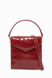 Site has information on duty free allowances for various countries, exchange rates for the bahraini dinar, and various promotions schemes, lotteries, raffles etc; Shop S Uvimol Burgundy Baby Mail To Me Crocodile Tote Bag For Women Ounass Bahrain