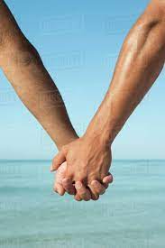 What does two men holding hands emoji mean? Two Men Holding Hands Cropped Stock Photo Dissolve
