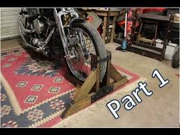 Homemade motorcycle lift constructed from wood and incorporating a steel front wheel chock. Homemade Motorcycle Stand Part 1 Youtube