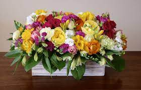 Vibrant Color Spring Garden Flower Arrangement With Lots Of Floral Goodies Spring Garden Flowers Flower Arrangements Floral Arrangements