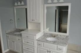 White ice granite with off white cabinets, stainless steel appliances and breakwater subway backsplash. Recent Projects Universal Stone Inc