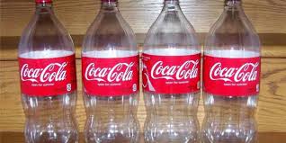 8 Ways To Grow In Coke Bottles Coke Bottle Bottle Garden Pop Bottles