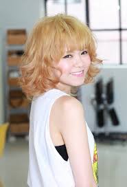The luscious waves can add much volume and bounce. Short Curly Hairstyle With Cute Bangs Hairstyles Weekly