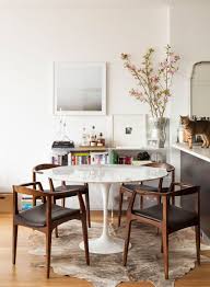 The Shape Of The Tulip Dining Table Has Become A Symbol Of Modernism This Sleek Design Is Perf Mid Century Modern Dining Room Modern Dining Room Modern Dining