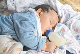 Asian Baby Sleeping And Drinking Milk From The Bottle Stock Photo Picture And Royalty Free Image Image 42443542