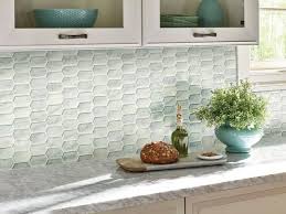 Calypso Picket Pattern Glass Mosaic Tiles Feature A Soft White Background With Tonal Inflections From T Glass Mosaic Backsplash Glass Mosaic Tiles Mosaic Glass