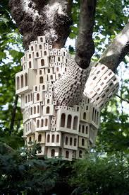 Thick Clusters Of Wooden Birdhouses By London Fieldworks Sprawl Across Tree Trunks In 2020 Bird Houses Bird Houses Diy Bird House