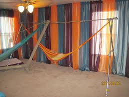 Polyester mesh hammock bed with space saving steel stand in navy and turquoise. Threaded Pipe Hammock Stand V3 2