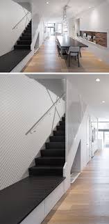 It says that there needs to be a landing at the bottom of the stairs that is at least as wide as the stairway and at least 3 ft. Design Idea For Stairs This Stair Landing Has Hidden Shoe Storage