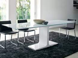 With two 20 leaves for a total length of 120 inches, the sleek and chic axiom dining table features a triangulated surface full of contemporary appeal. Extendable Dining Tables Ultra Modern