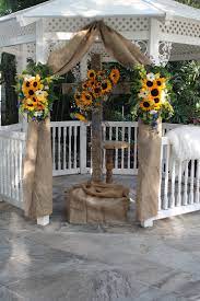 Burlap Sunflowers And Gerberas Decorate Cross And Gazebo Gazebo Wedding Decorations Outdoor Wedding Gazebo Gazebo Decorations