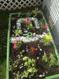 Water Table Turned Garden Table For The Kids I Decided Not To Throw Away My Old Step2 Water Table But Dinosaur Garden Fun Activities To Do Outdoor Play Spaces