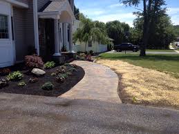 A front yard or garden path can be its own work of art trailing through a simple grass lawn. Front Walkway Landscaping Houzz
