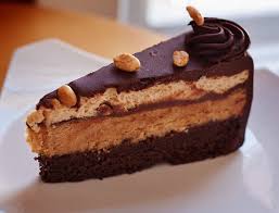 Whoa there, what are you doing? The Buckeye Torte A Layer Each Of Chocolate Cake Buckeye Truffle Filling And Peanut Butter Mousse Iced In Chocolate Ganache Picture Of Sweet Surrender Dessert Cafe Louisville Tripadvisor
