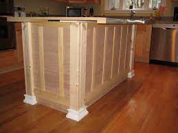 For an upscale cabinet design for small kitchen appear, dark wood cabinet doors are a beautiful contrast to lighter countertops, walls and floors. Down To Earth Style Kitchen Island Makeover Kitchen Island Cabinets Diy Kitchen Cabinets