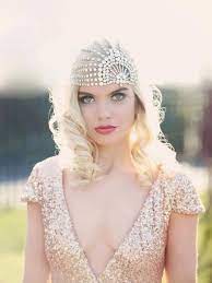The top portion of the haircut is more prominent and has a rugged and subtle edge due o the length at the top. 1920s Gatsby Glam Bridal Hair Inspiration Southbound Bride