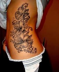 Wonderful Black Hibiscus Flowers Tattoo On Side Rib Hibiscus Tattoo Tattoos Hibiscus Flower Tattoos