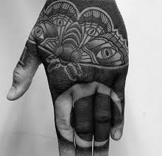 70 All Black Tattoos For Men Blackout Design Ideas Hand Tattoos All Black Tattoos Full Hand Tattoo