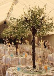 Flower Tree Centrepieces By Essential Wedding Hire At Micklefield Hall Tree Wedding Centerpieces Tree Centrepiece Wedding Wedding Centerpieces