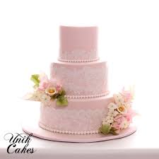 Blush Pink Wedding Cake With Lace And Roses This Beautiful 3 Tiered Cake Was Decorate Wedding Cakes Lace Flowers Lace Wedding Cake Wedding Cakes With Flowers