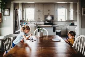 An arts & crafts house sets an eclectic table, mixing in dinnerware from later eras. Kids Arts Crafts Stock Photos Offset