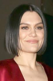 The hair around the crown of the head is blown out in waves, and the line up keeps everything tidy. Jessie J S Hairstyles Hair Colors Steal Her Style