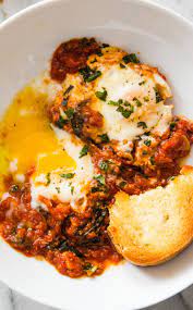 Eggs In Purgatory This Recipe Poaches The Eggs Directly In A Spicy Red Sauce That Is Equally As Good For Breakfast A Lunch Appetizers Recipes Italian Recipes