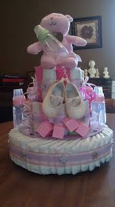 Diaper Cake Made From Diapers Onesie S Bibs Paci S Shoes Bottles Teddy Bear And Other Toy Cute Baby Shower Gifts Diy Baby Shower Gifts Baby Shower Gifts