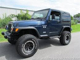 Image result for Patriot Blue 2002 Jeep