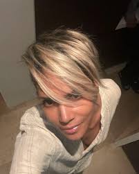 Halle Berry shows off dramatic hair transformation with half-shaved head as  fans say 'no one does short styles' like her