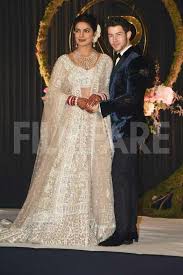 Stunning Mr And Mrs Jonas For Their Wedding Reception In Delhi Indian Wedding Dress Priyanka Chopra Wedding Bridal Outfits