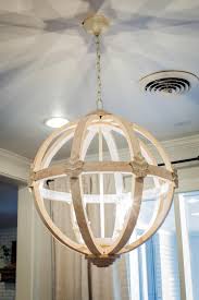 11 Ways To Get The Fixer Upper Look In Your Home Farmhouse Light Fixtures Joanna Gaines Light Fixtures Wooden Chandelier