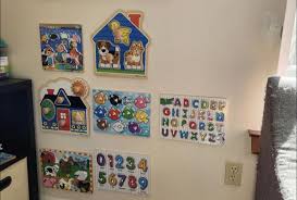 use command strips to stick puzzles to the wall, add velcro to each piece!  creates a whole new toy 🧩 · Viral Baby Products · Facebook