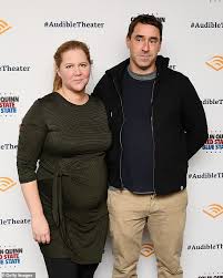 It's hard to tell when they started dating because both keep silent about it. Amy Schumer Reveals Her Husband Chris Fischer Has Autism Spectrum Disorder Daily Mail Online