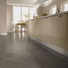 Check out some of our favorite kitchen flooring ideas with gray cabinets for inspiration. Cream Kitchen Cabinets With Dark Countertops And Grey Floors Google Search Modern Kitchen Tiles Design Modern Kitchen Tile Floor Floor Tile Design