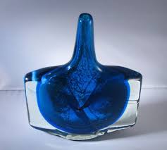 It has a central swirl decoration and triangular s. Mdina Michael Harris Art Glass Large Axe Fish Head Lollipop Etsy Blue Art Glass Vase Glass Art Hand Blown Vases
