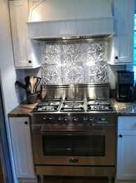 Pin By Party Idea Pros On Ceiling Tile Ideas Tin Backsplash Kitchen Metallic Backsplash Metal Backsplash Kitchen