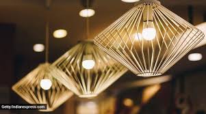 Modern kitchen with wood accent wall. Lighting Basics To Make Your Home Come Alive Lifestyle News The Indian Express