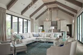The main floor of our home is very open and most of the spaces connect to one another. White Sectional On Blue And Silver Rug Cottage Living Room