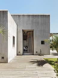A Look Inside A Stunning Rustic And Modern Home In Uruguay Industrial House Exterior Modern Beach House Rustic Beach House