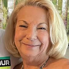 Should tulip bulbs be planted right away or stored until fall in Zone 5a/5b?