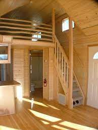 Steep But Its A Staircase Rather Than A Ladder Love It So Much Storage Available Under The Stairs Click Tiny House Cabin A Frame House Tiny House Movement