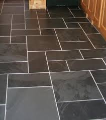 Skinny charcoal grey black tile in herringbone pattern for shower. Slate Floor Tiles For Kitchens And Bathrooms In Black Grey Cinza