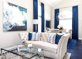 Gorgeous Blue And White Glam Living Room Decor With Elegant White Velvet Tufted Sofa Modern Gla In 2020 Glam Living Room Decor Blue Living Room Decor Glam Living Room