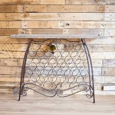 This versatile wine rack has a sturdy wooden frame in a crisp white finish and features a slim marble top. Console Table With Wine Rack Wine Rack Table Curiosity Interiors