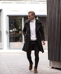 In this studio shot you can see how a turtleneck does a great job of tying the whole outfit together. Men S Trench Coats Buying Guide Outfit Ideas Mens Winter Fashion Men S Trench Coat Trench Coat Black