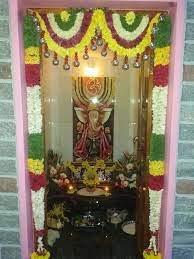 Since the pooja room is considered to be the sacred center of home which brings positive energy to the house the beautiful painting of lord krishna and the lotus flowers has interesting details and a lovely choice of colours. Best Pooja Flower Decora Best Balloon Decorator S In Bangalore India